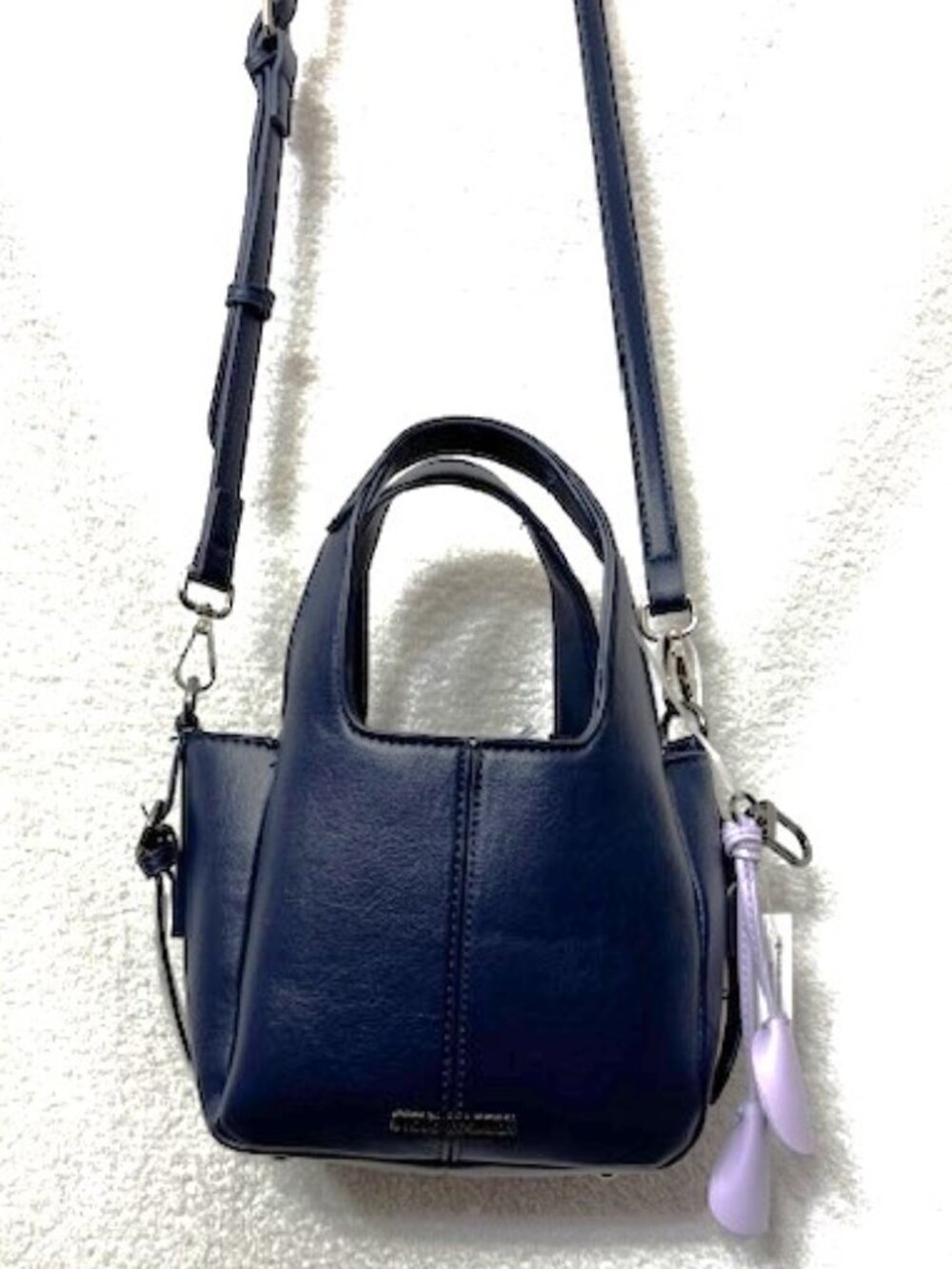 Steve Madden small navy crossbody with removable lilac flower bag charm NWT
